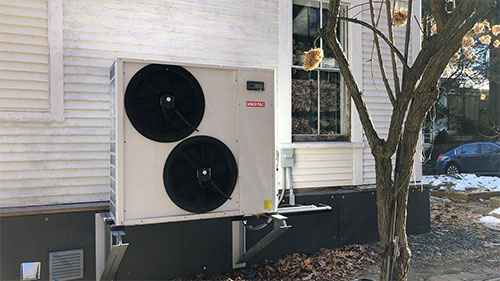 Heat pump placed outside of home